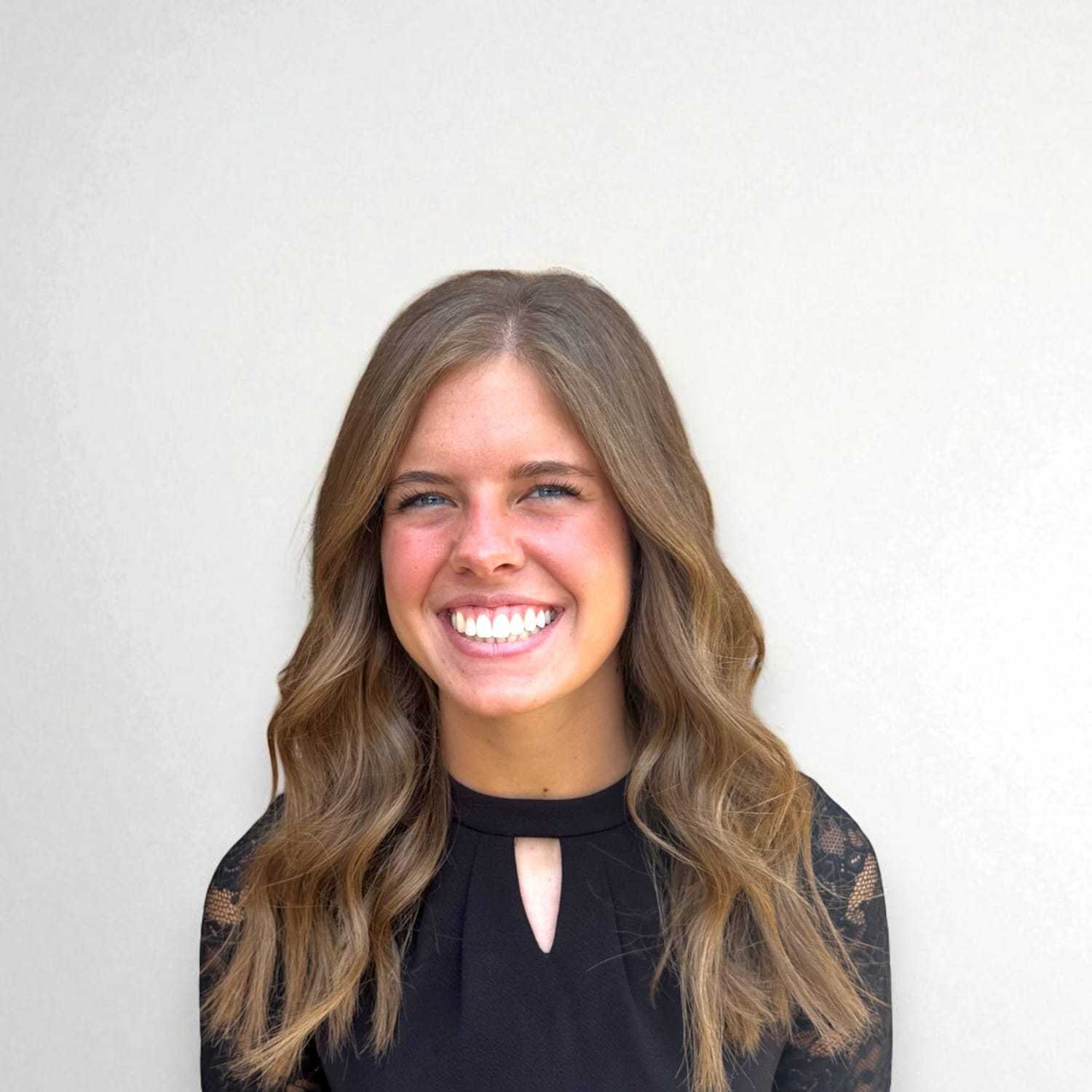 Portrait of Allison N, a professional stylist at Design 1 Salon & Spa, showcasing their expertise and style.