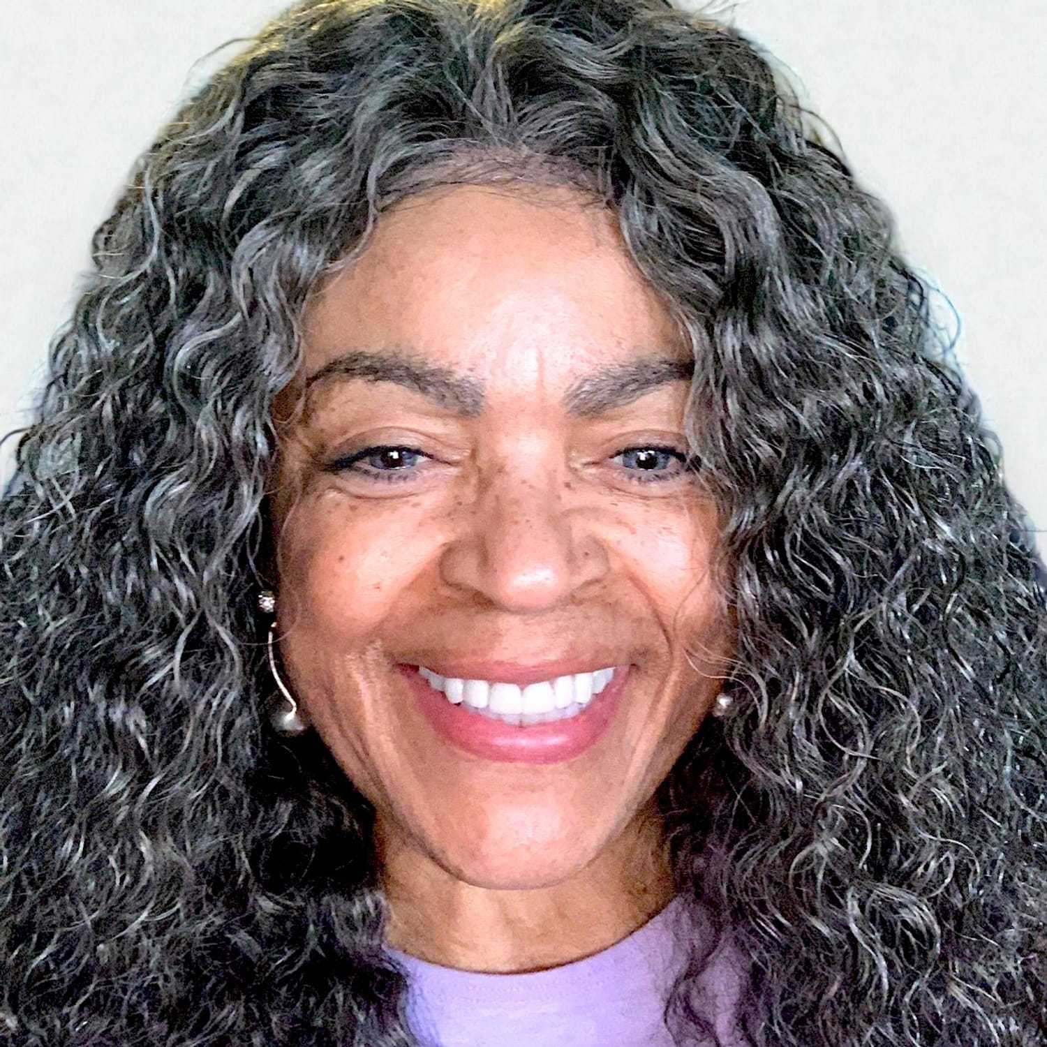 Portrait of Dana	A, a professional stylist at Design 1 Salon & Spa, showcasing their expertise and style.