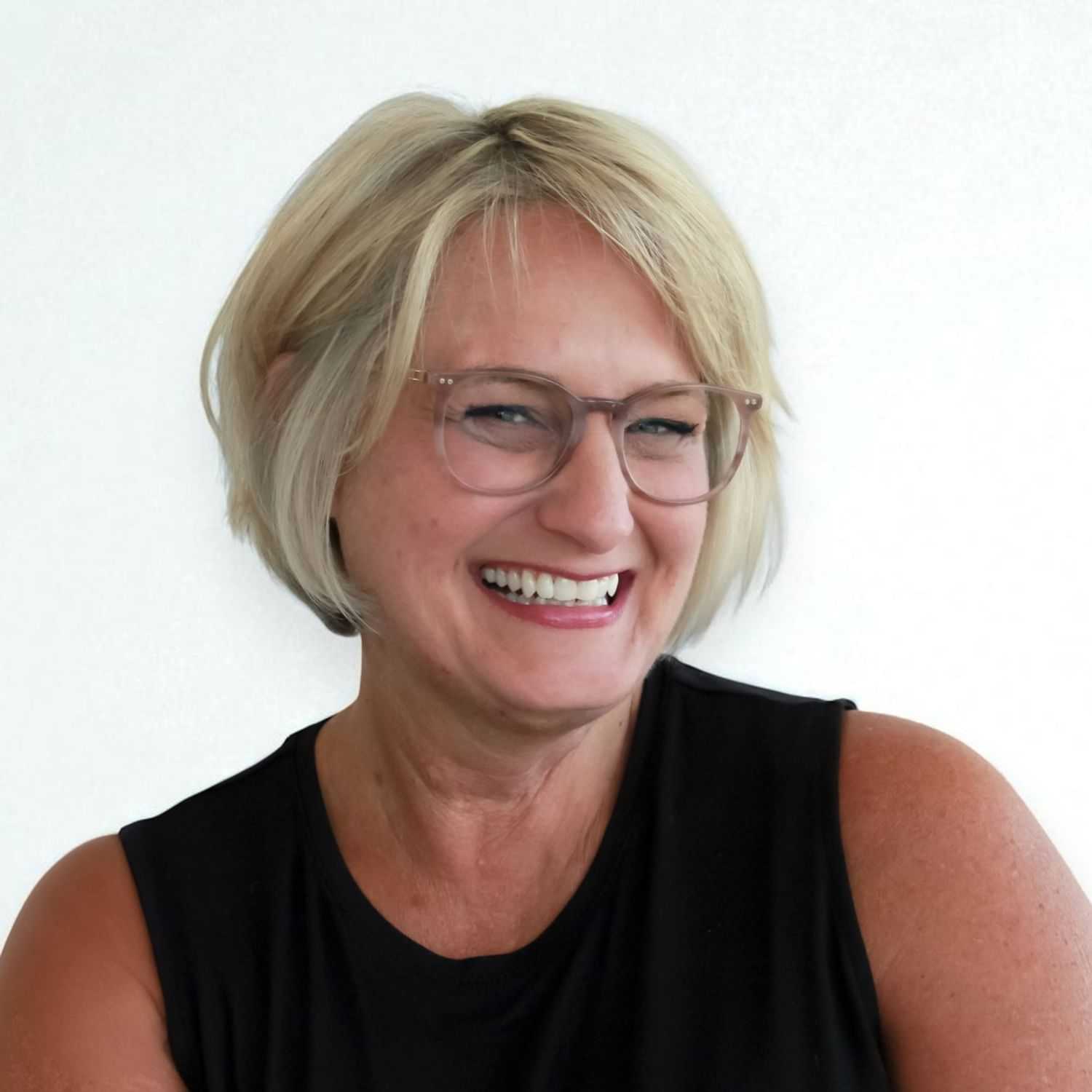 Portrait of Laura V, a professional stylist at Design 1 Salon & Spa, showcasing their expertise and style.