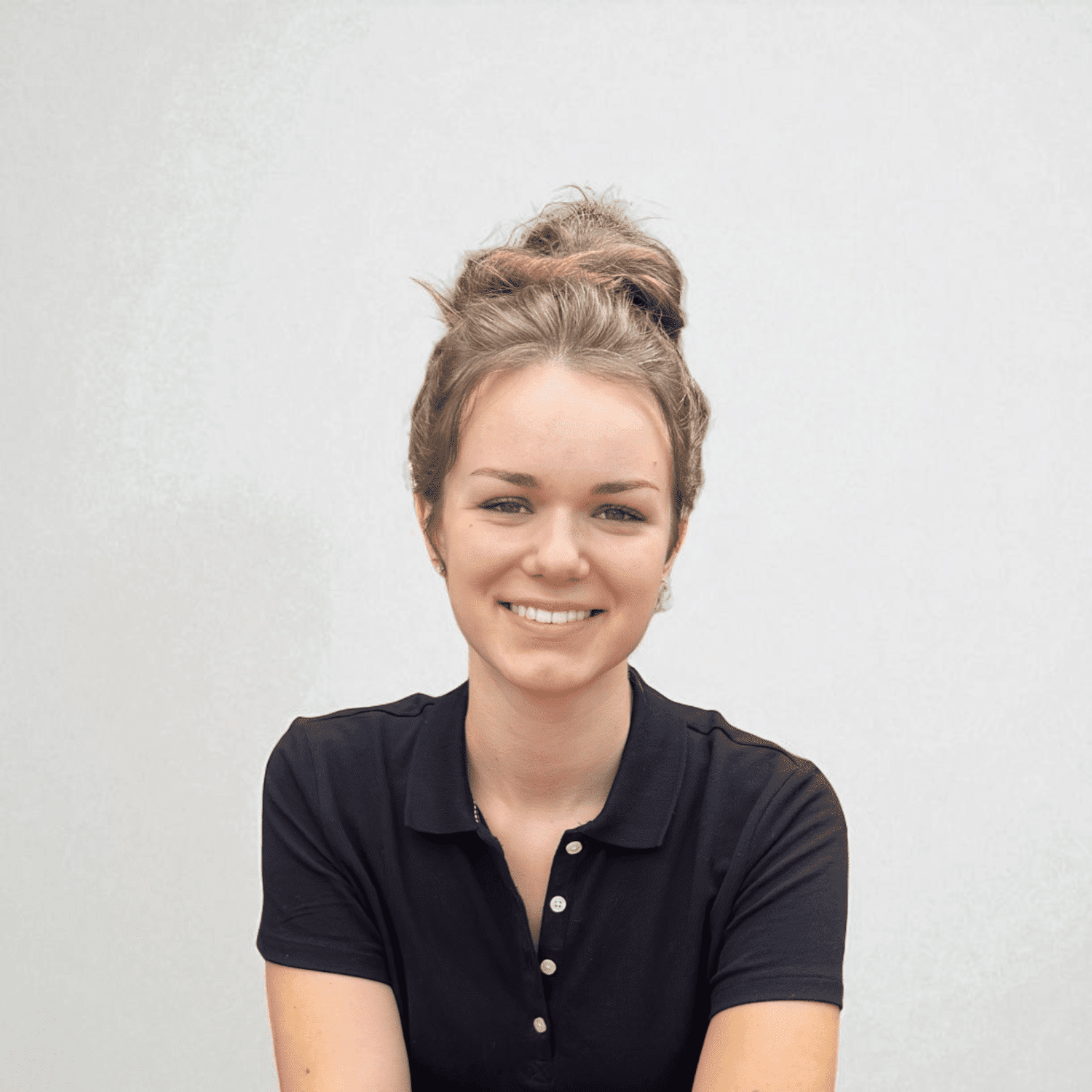 Portrait of Anastashia	M, a professional stylist at Design 1 Salon & Spa, showcasing their expertise and style.