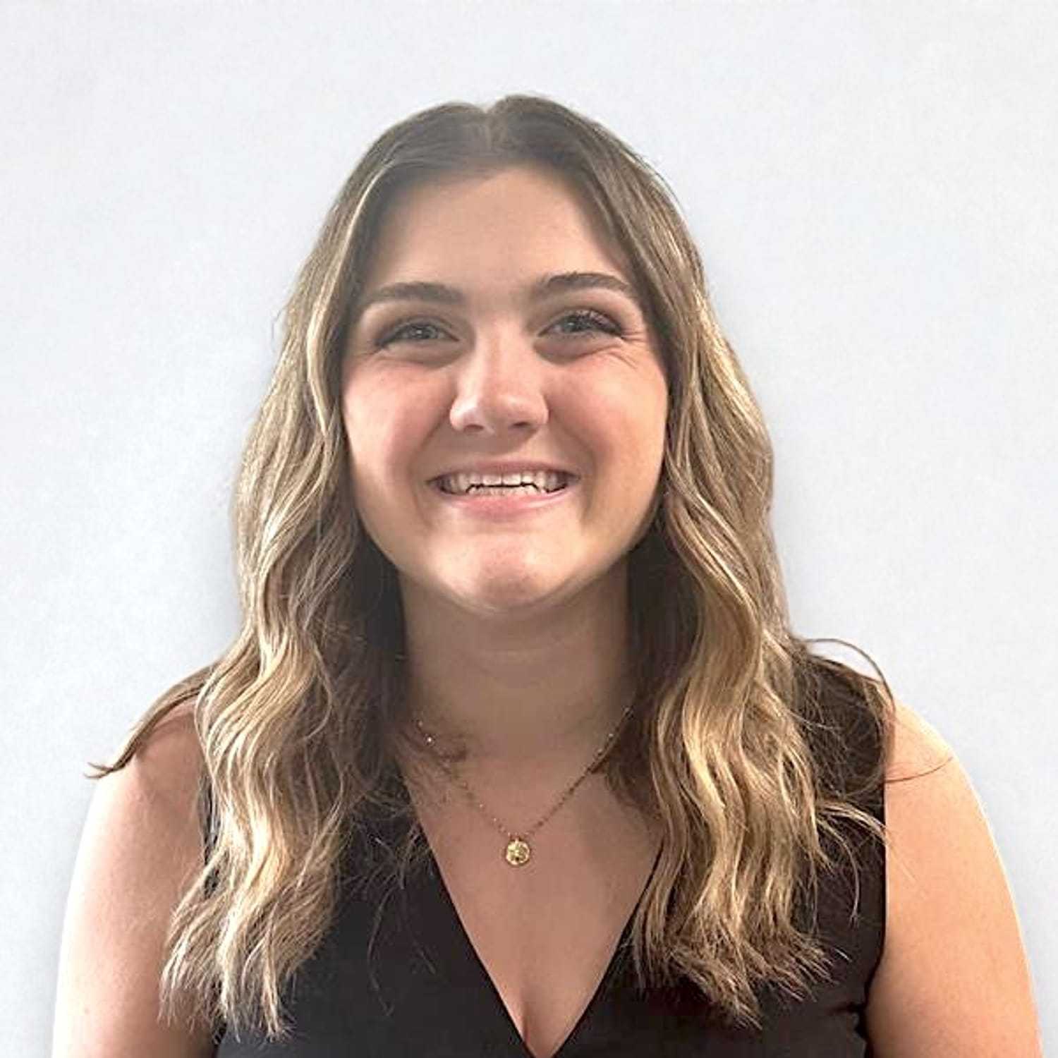 Portrait of Rachel M, a professional stylist at Design 1 Salon & Spa, showcasing their expertise and style.