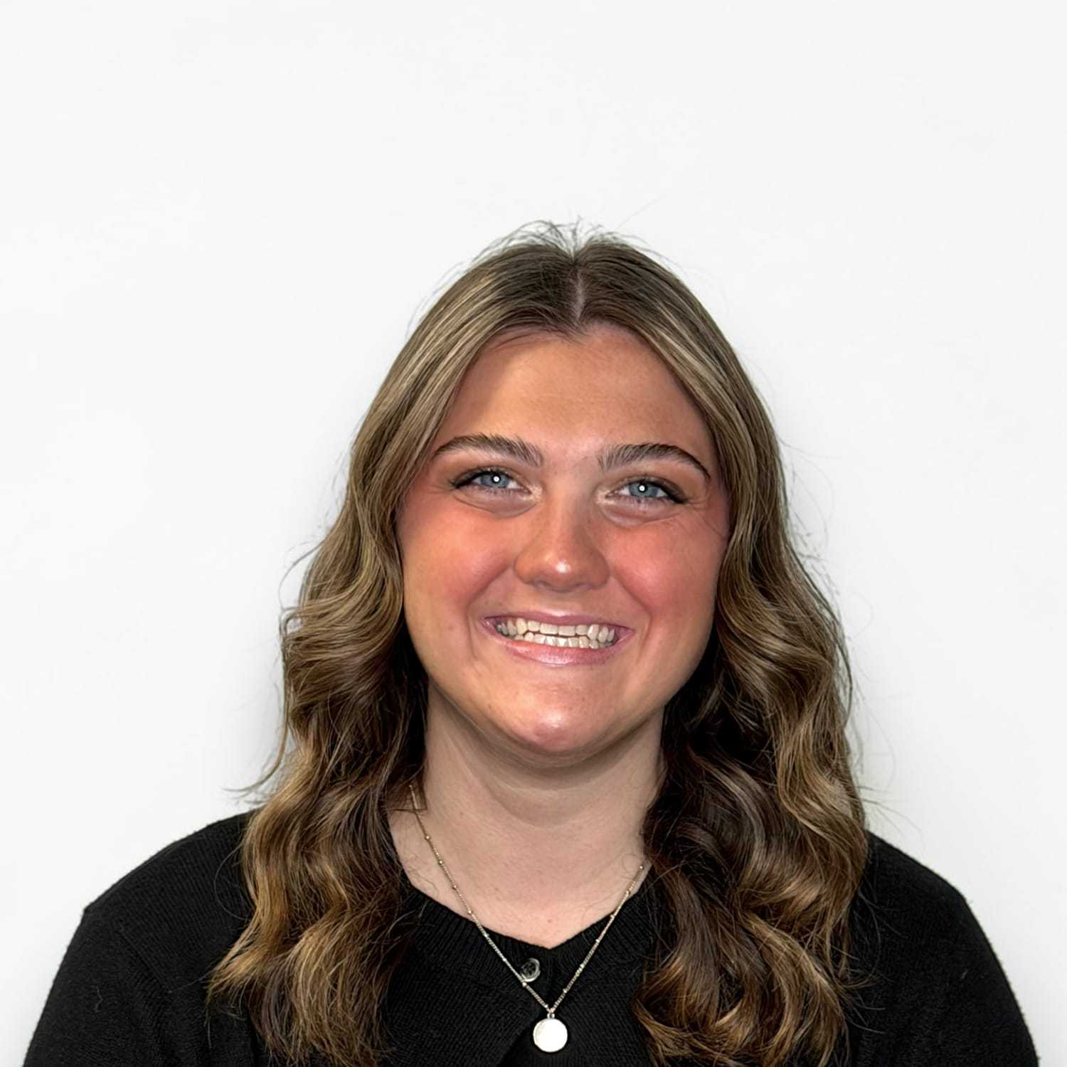 Portrait of Rachel M, a professional stylist at Design 1 Salon & Spa, showcasing their expertise and style.