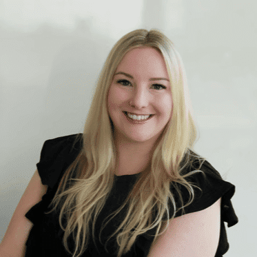 Portrait of Elle S, a professional stylist at Design 1 Salon & Spa, showcasing their expertise and style.
