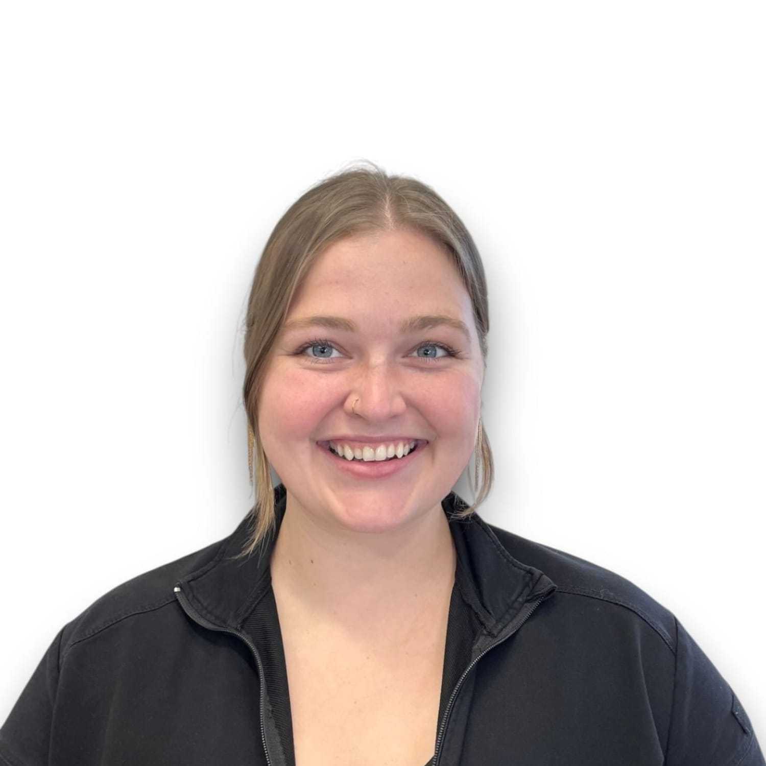 Portrait of Brinlee D, a professional stylist at Design 1 Salon & Spa, showcasing their expertise and style.