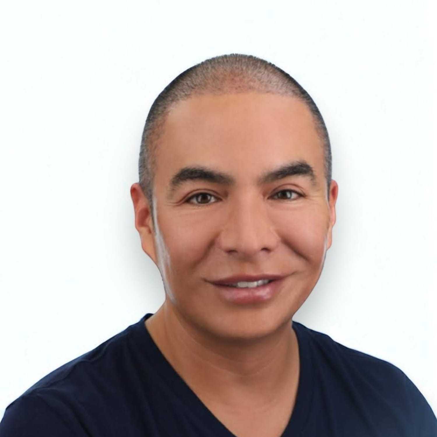 Portrait of George R, a professional stylist at Design 1 Salon & Spa, showcasing their expertise and style.