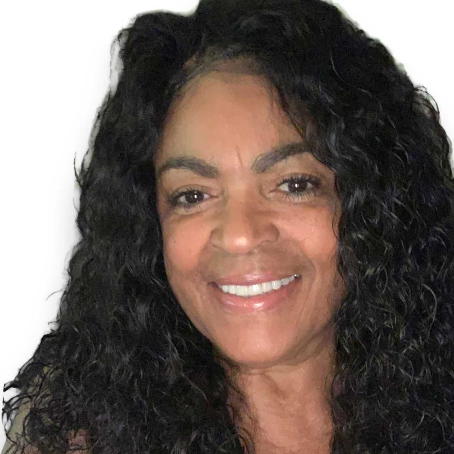 Portrait of Dana	A, a professional stylist at Design 1 Salon & Spa, showcasing their expertise and style.