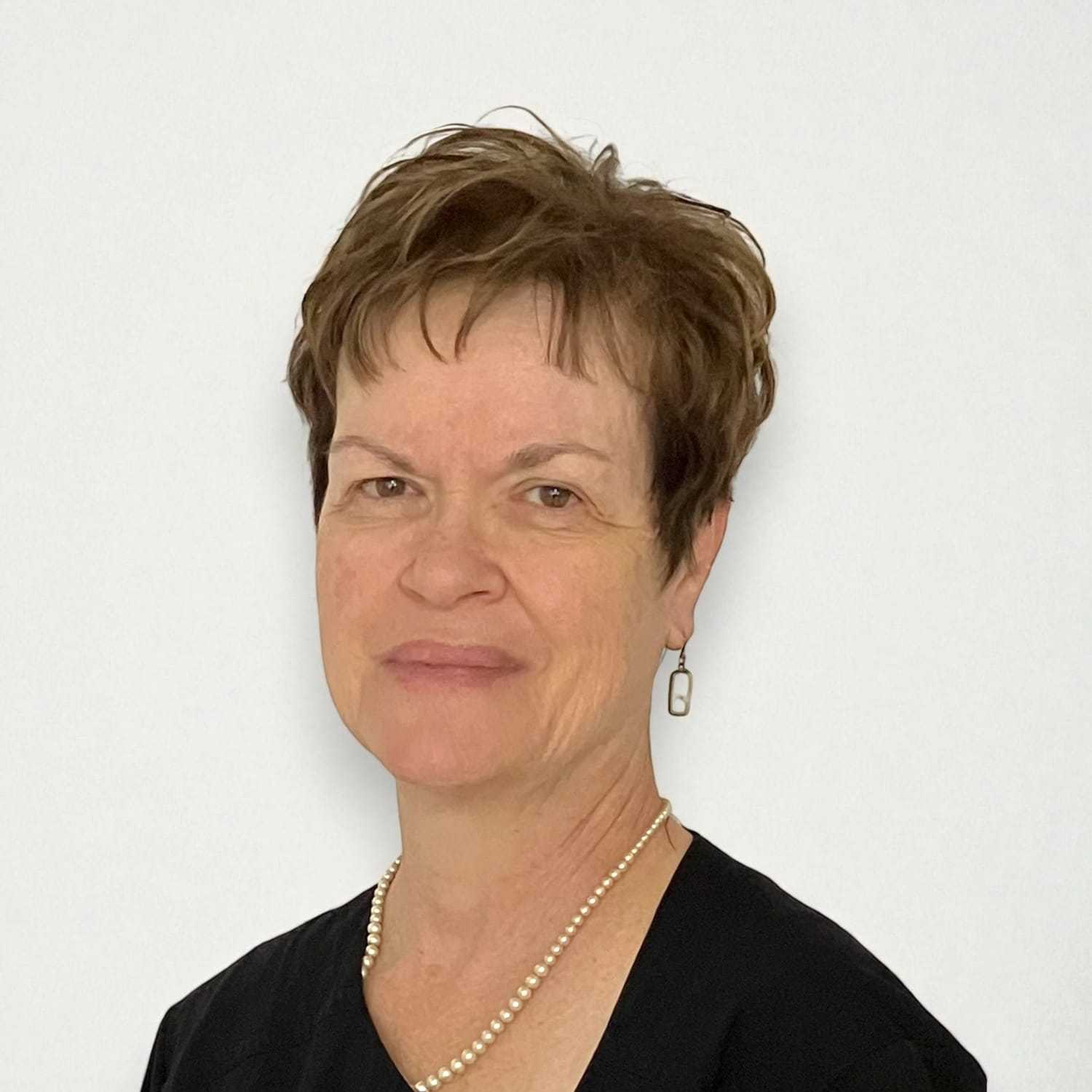 Portrait of Diane Z, a professional stylist at Design 1 Salon & Spa, showcasing their expertise and style.