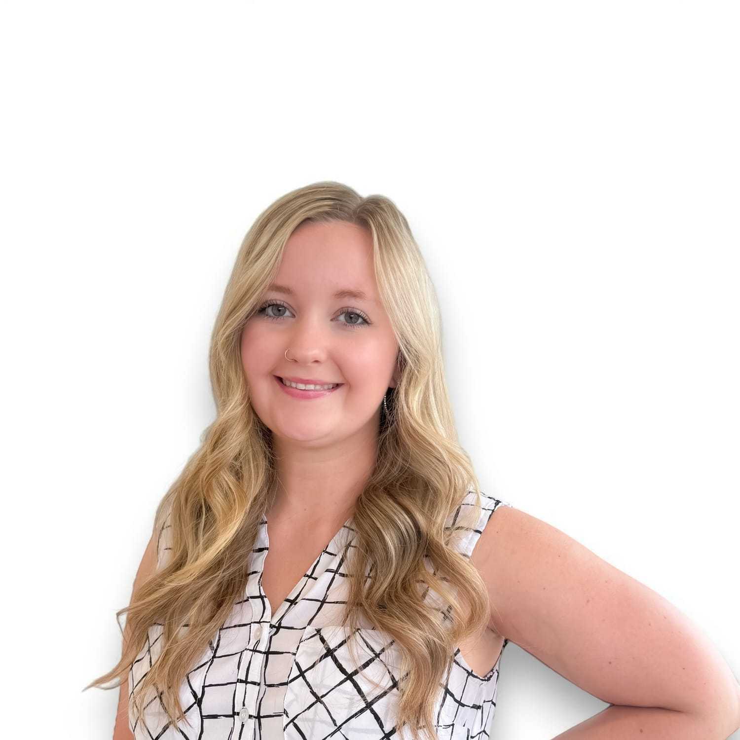 Portrait of Kayla R, a professional stylist at Design 1 Salon & Spa, showcasing their expertise and style.