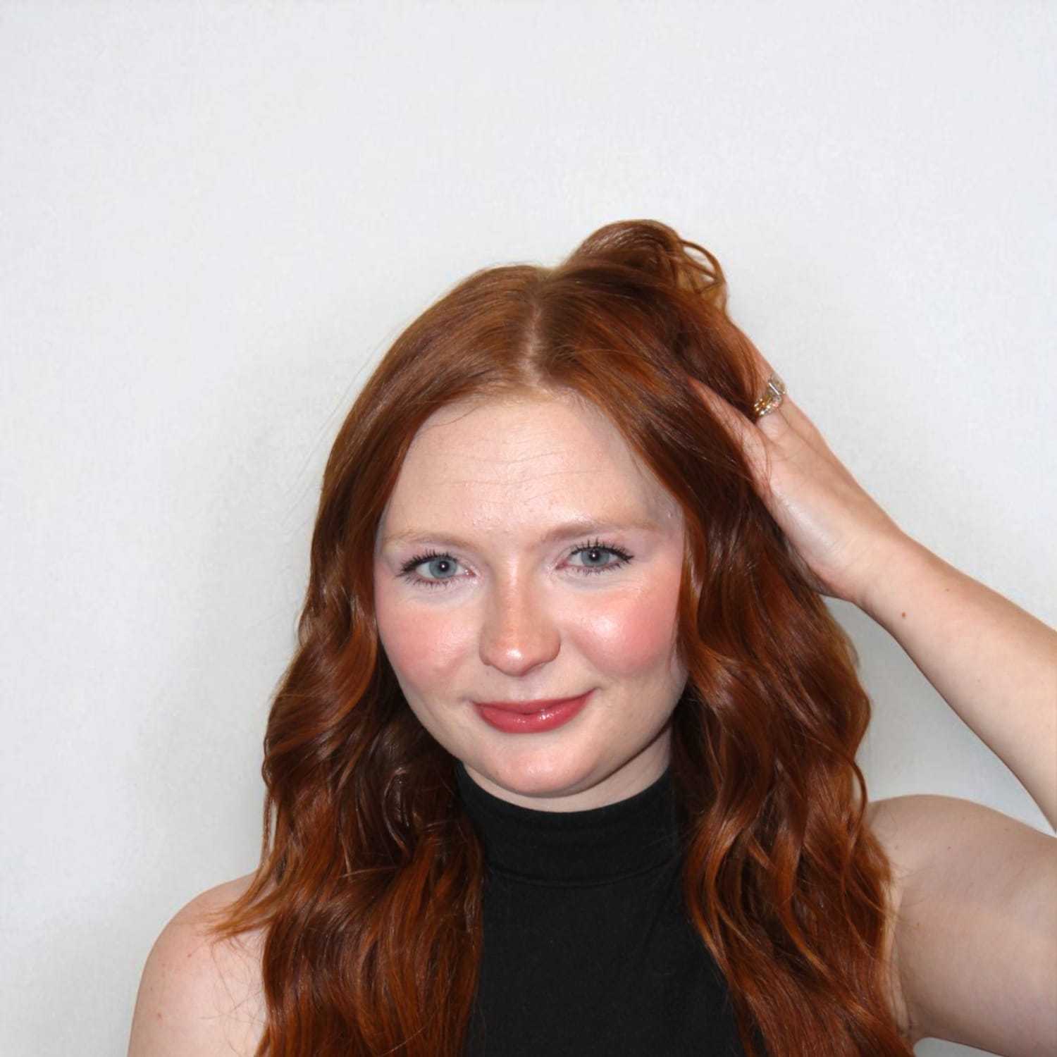 Portrait of Cali S, a professional stylist at Design 1 Salon & Spa, showcasing their expertise and style.