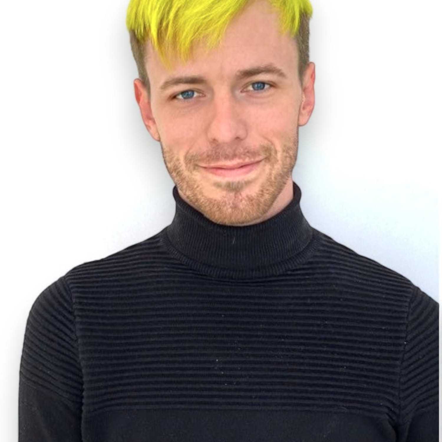 Portrait of Camden A, a professional stylist at Design 1 Salon & Spa, showcasing their expertise and style.