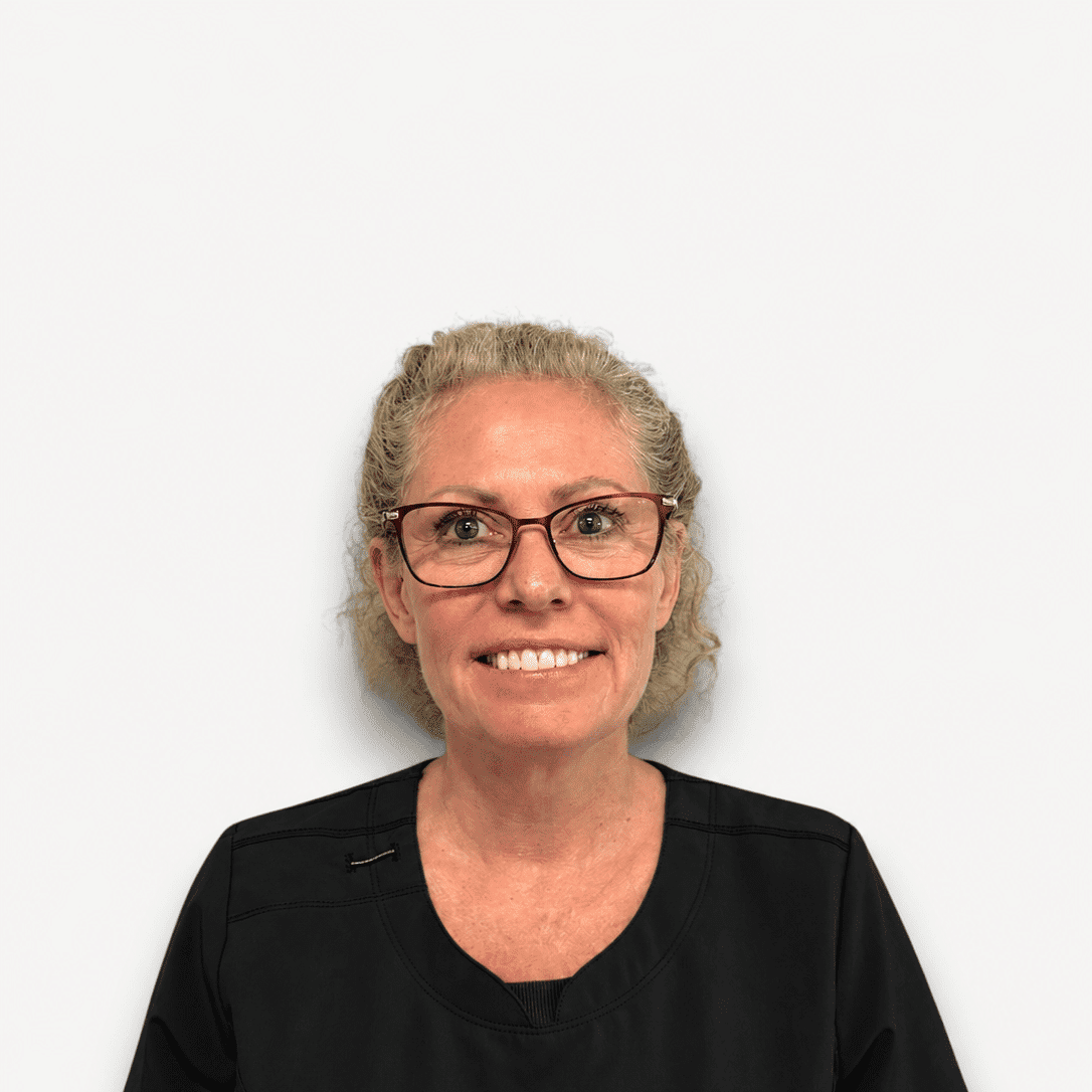 Portrait of Gigi S, a professional stylist at Design 1 Salon & Spa, showcasing their expertise and style.