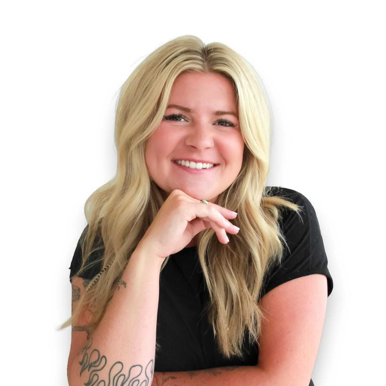 Portrait of Bailey B, a professional stylist at Design 1 Salon & Spa, showcasing their expertise and style.