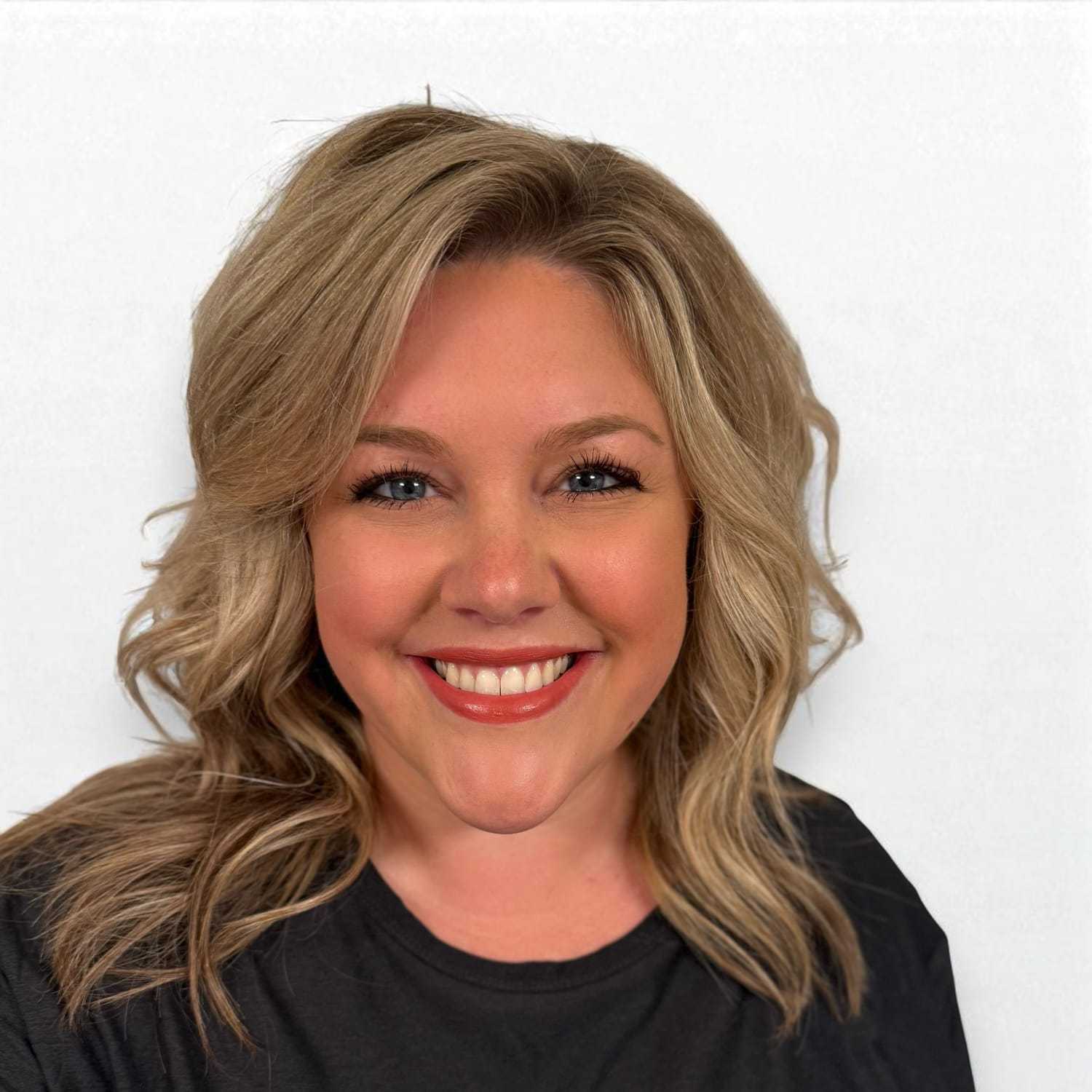 Portrait of Samantha T, a professional stylist at Design 1 Salon & Spa, showcasing their expertise and style.