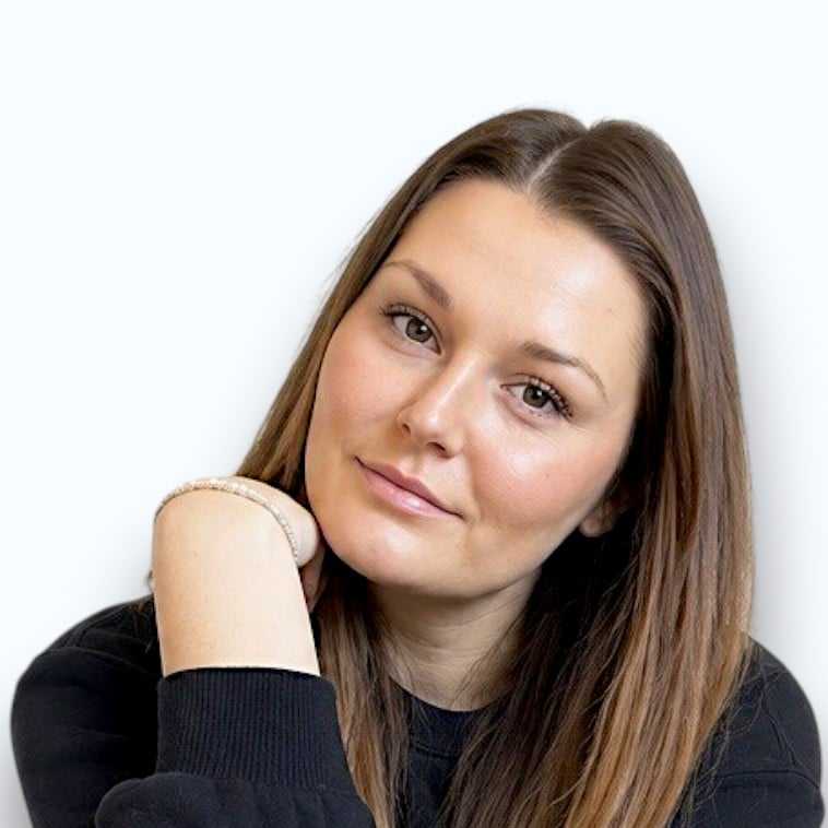 Portrait of JJ, a professional stylist at Design 1 Salon & Spa, showcasing their expertise and style.