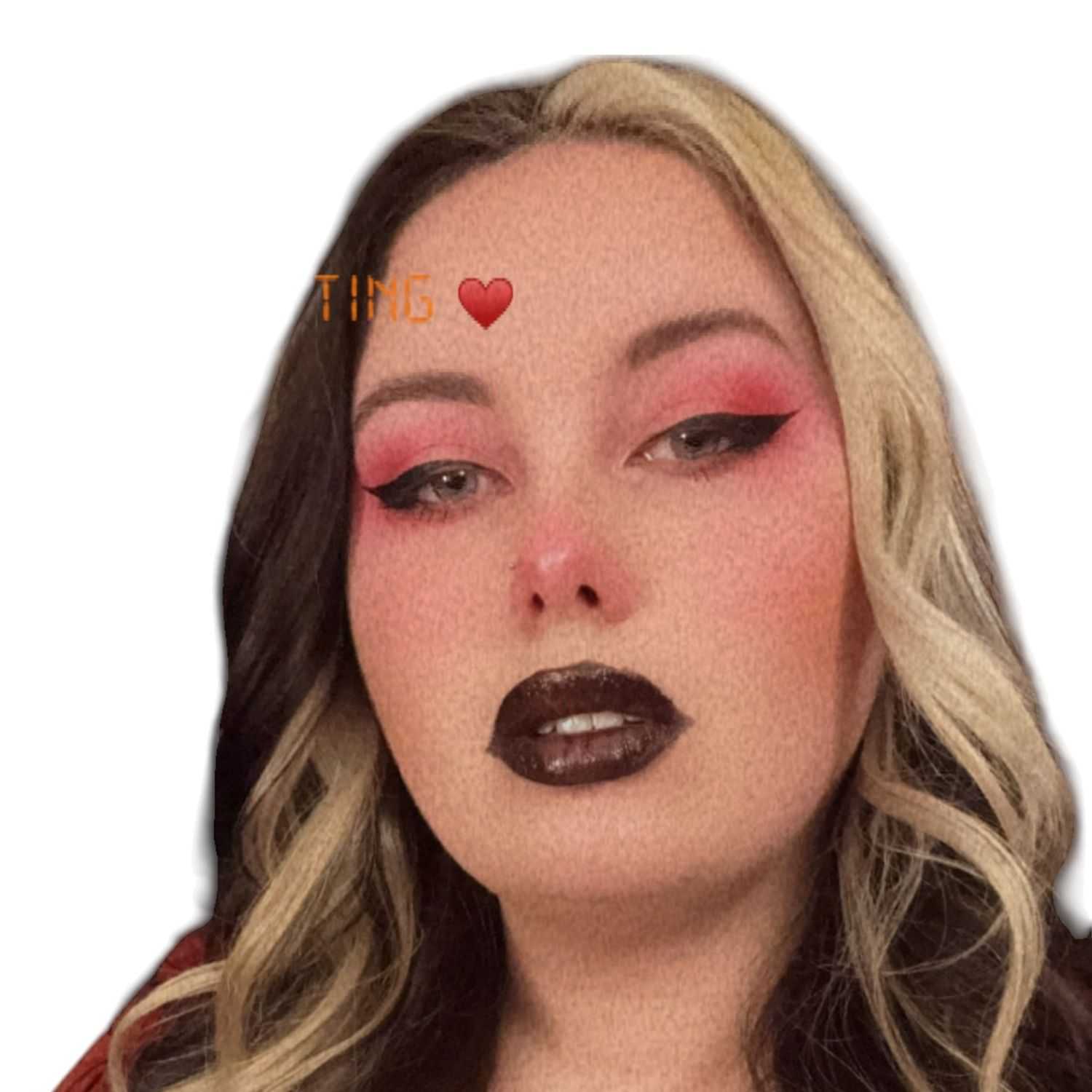 Portrait of Riot H, a professional stylist at Design 1 Salon & Spa, showcasing their expertise and style.