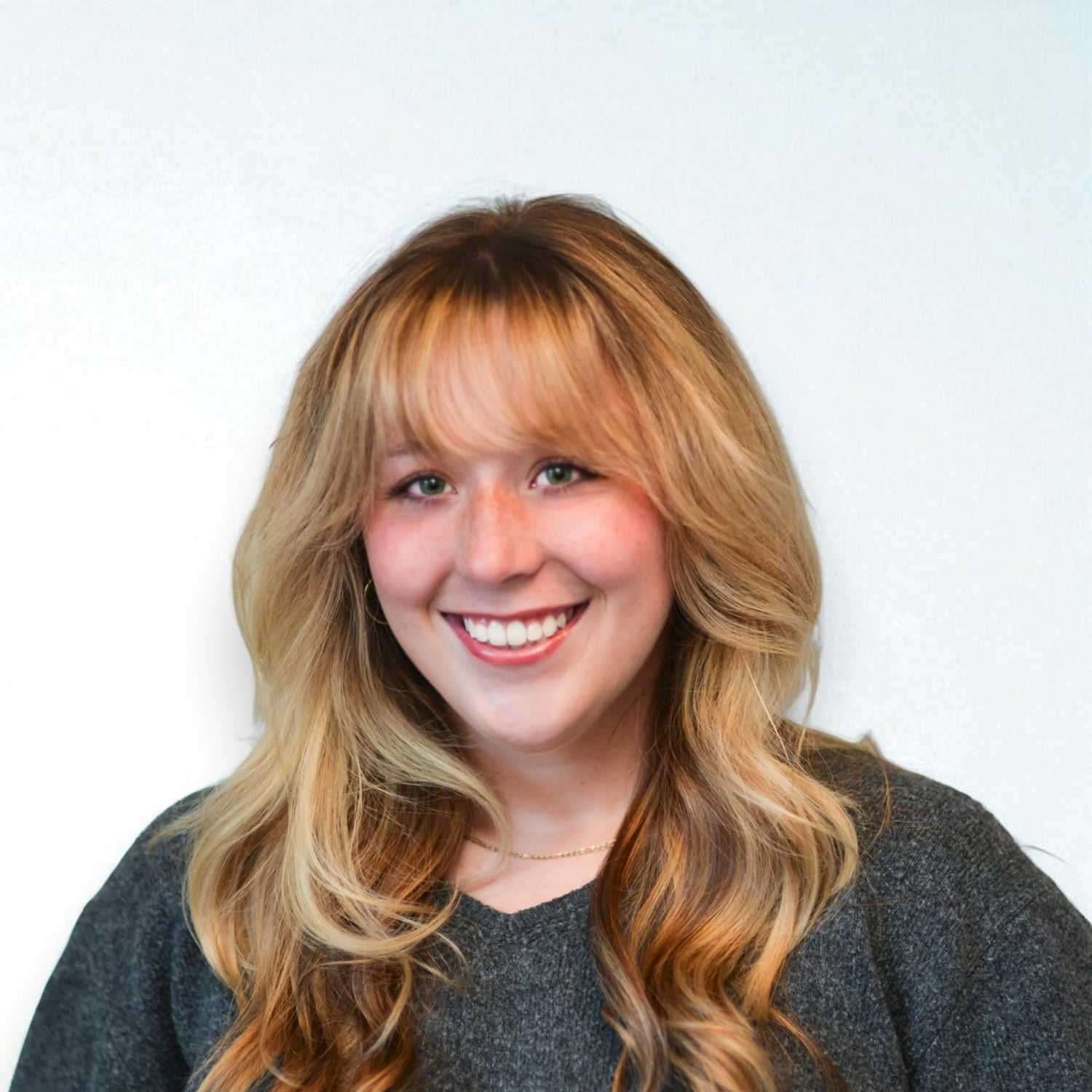 Portrait of Laci W, a professional stylist at Design 1 Salon & Spa, showcasing their expertise and style.