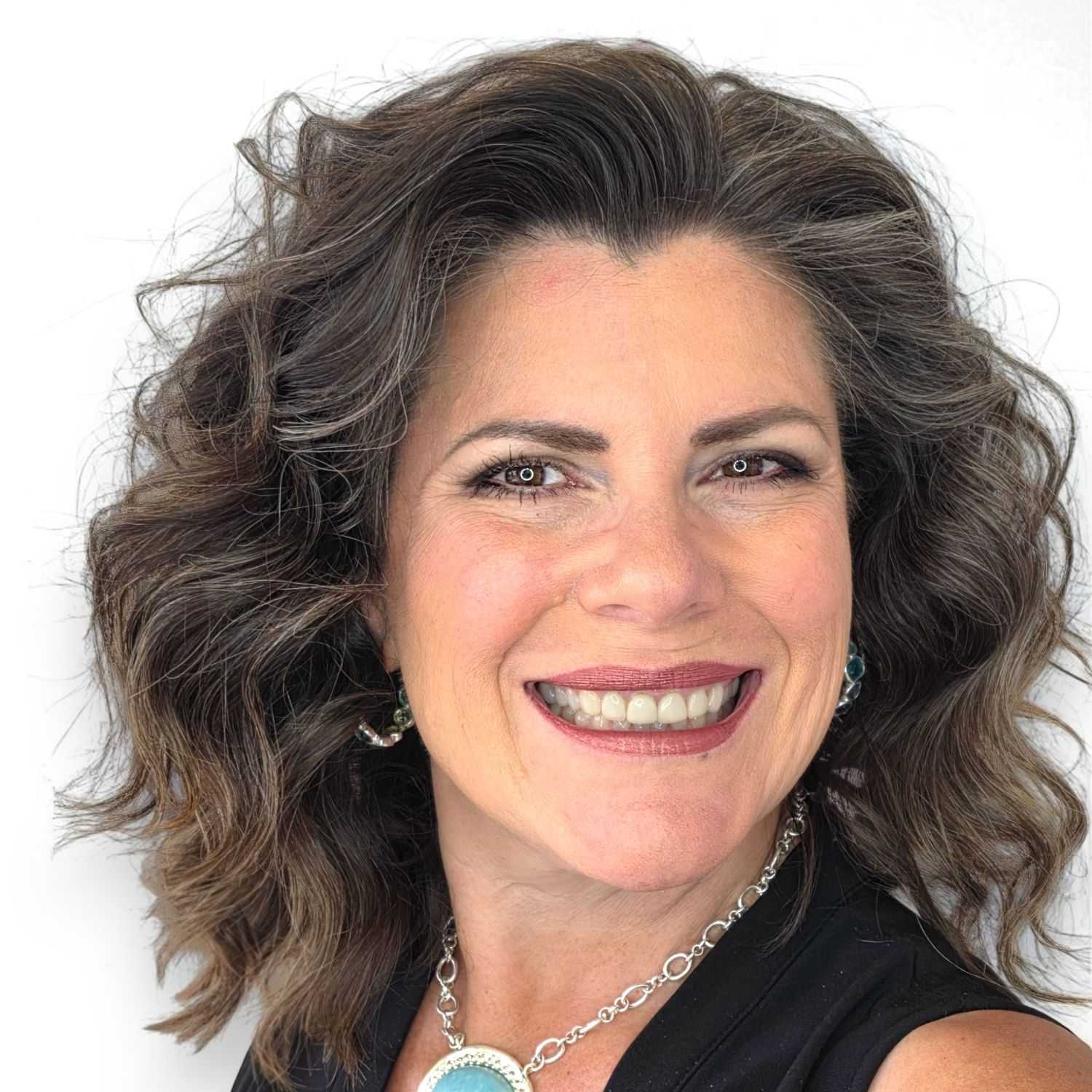 Portrait of Beth Ann D, a professional stylist at Design 1 Salon & Spa, showcasing their expertise and style.