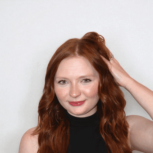 Portrait of Cali S, a professional stylist at Design 1 Salon & Spa, showcasing their expertise and style.