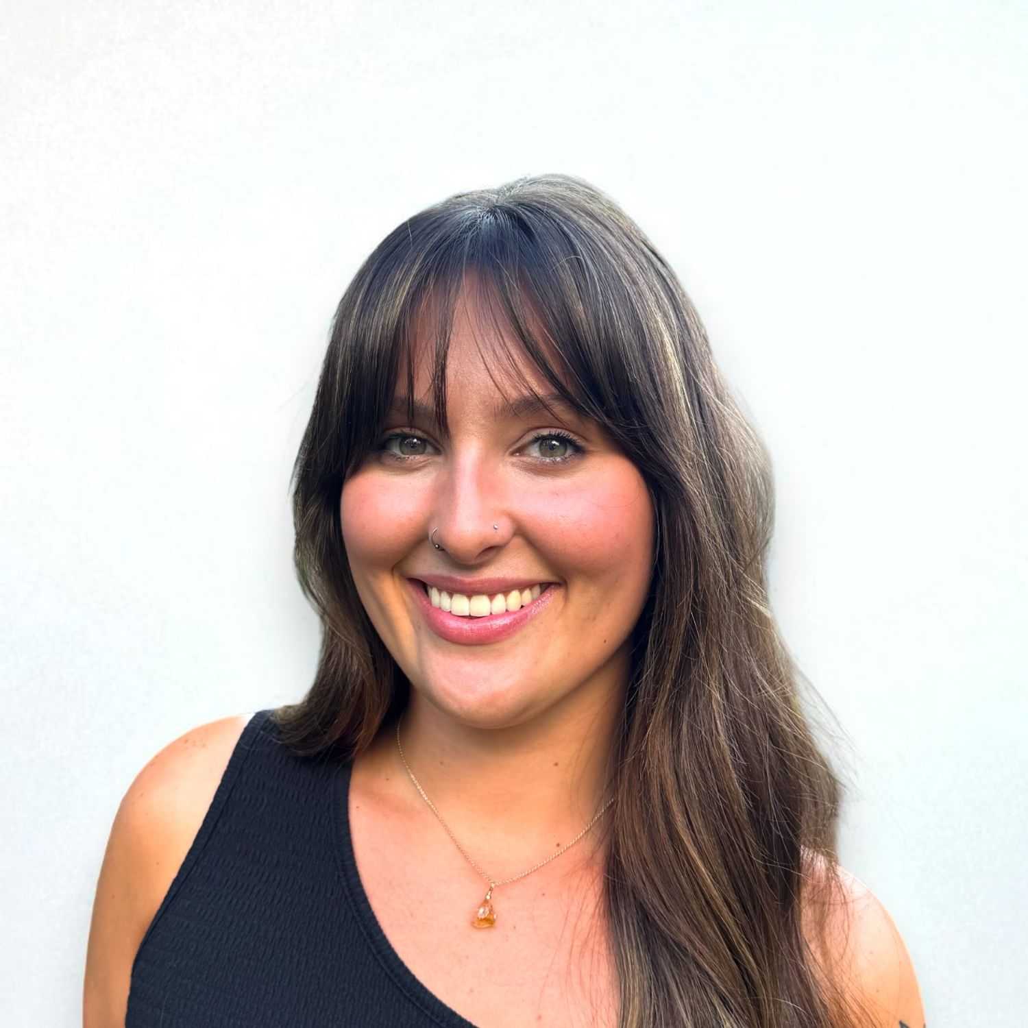 Portrait of Madison R, a professional stylist at Design 1 Salon & Spa, showcasing their expertise and style.