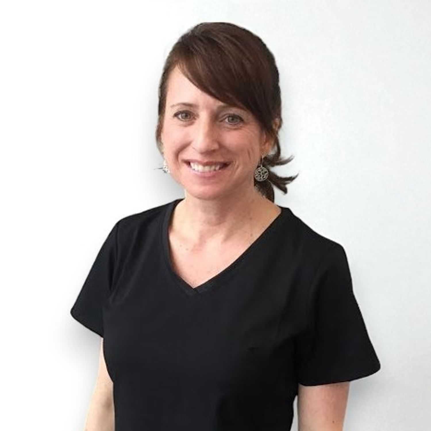 Portrait of Suzette L, a professional stylist at Design 1 Salon & Spa, showcasing their expertise and style.