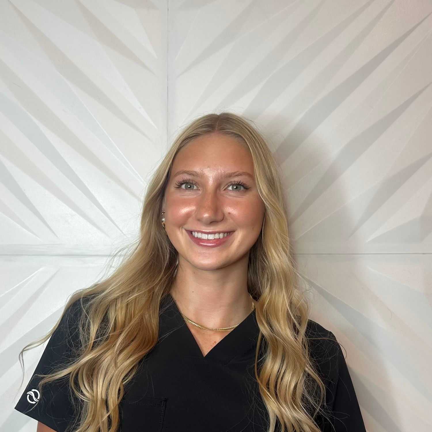 Portrait of Summer N, a professional stylist at Design 1 Salon & Spa, showcasing their expertise and style.