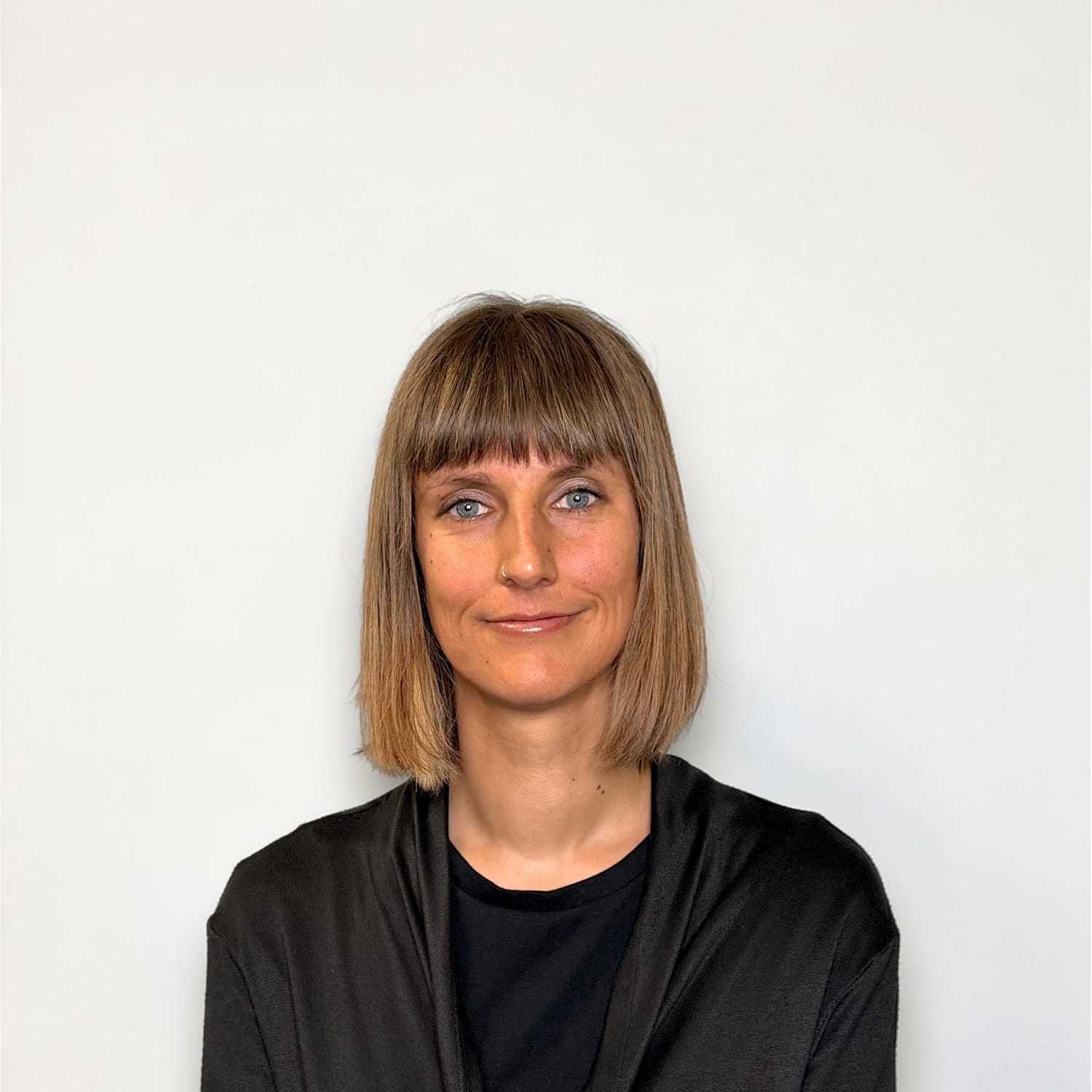 Portrait of Chelsea B, a professional stylist at Design 1 Salon & Spa, showcasing their expertise and style.
