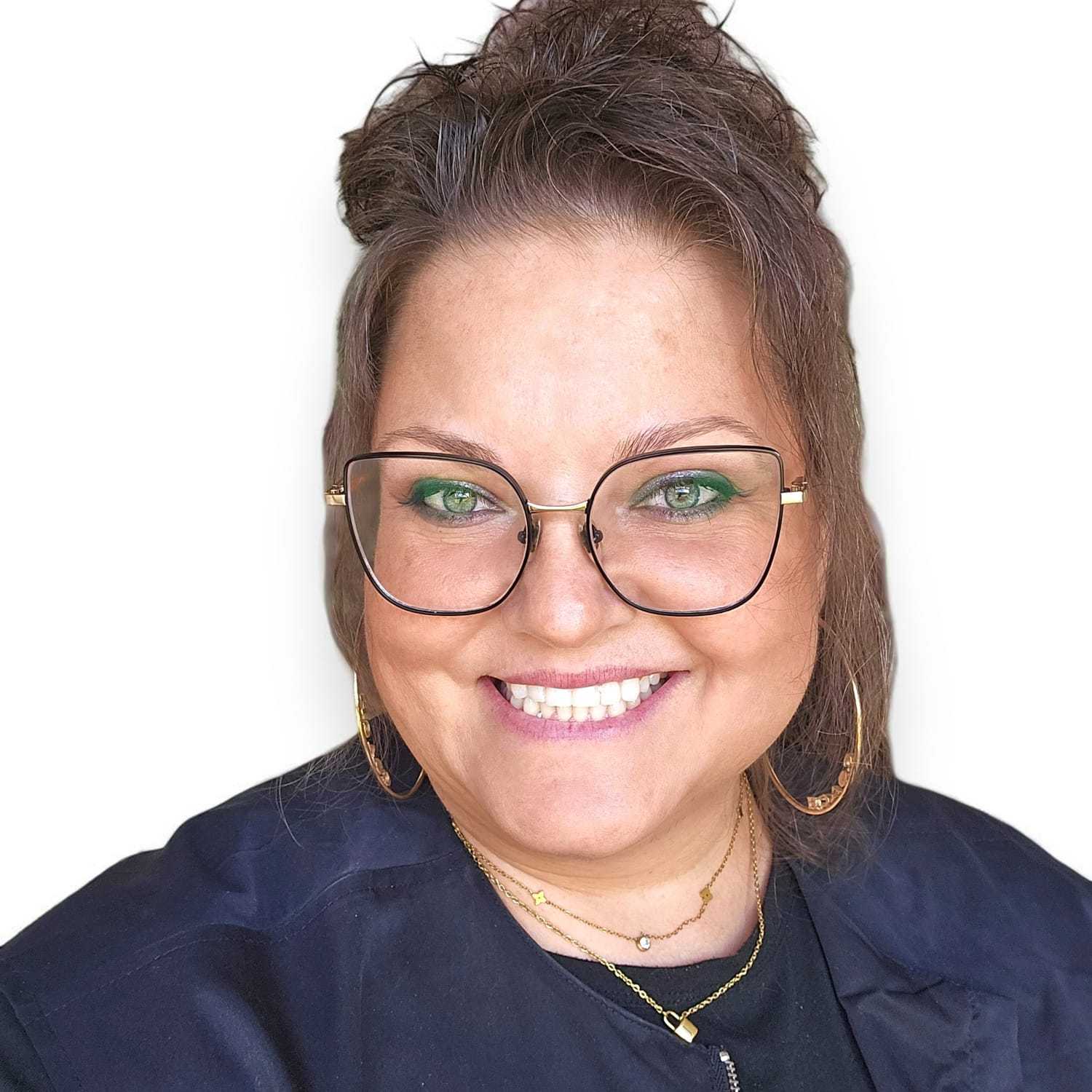 Portrait of JP, a professional stylist at Design 1 Salon & Spa, showcasing their expertise and style.