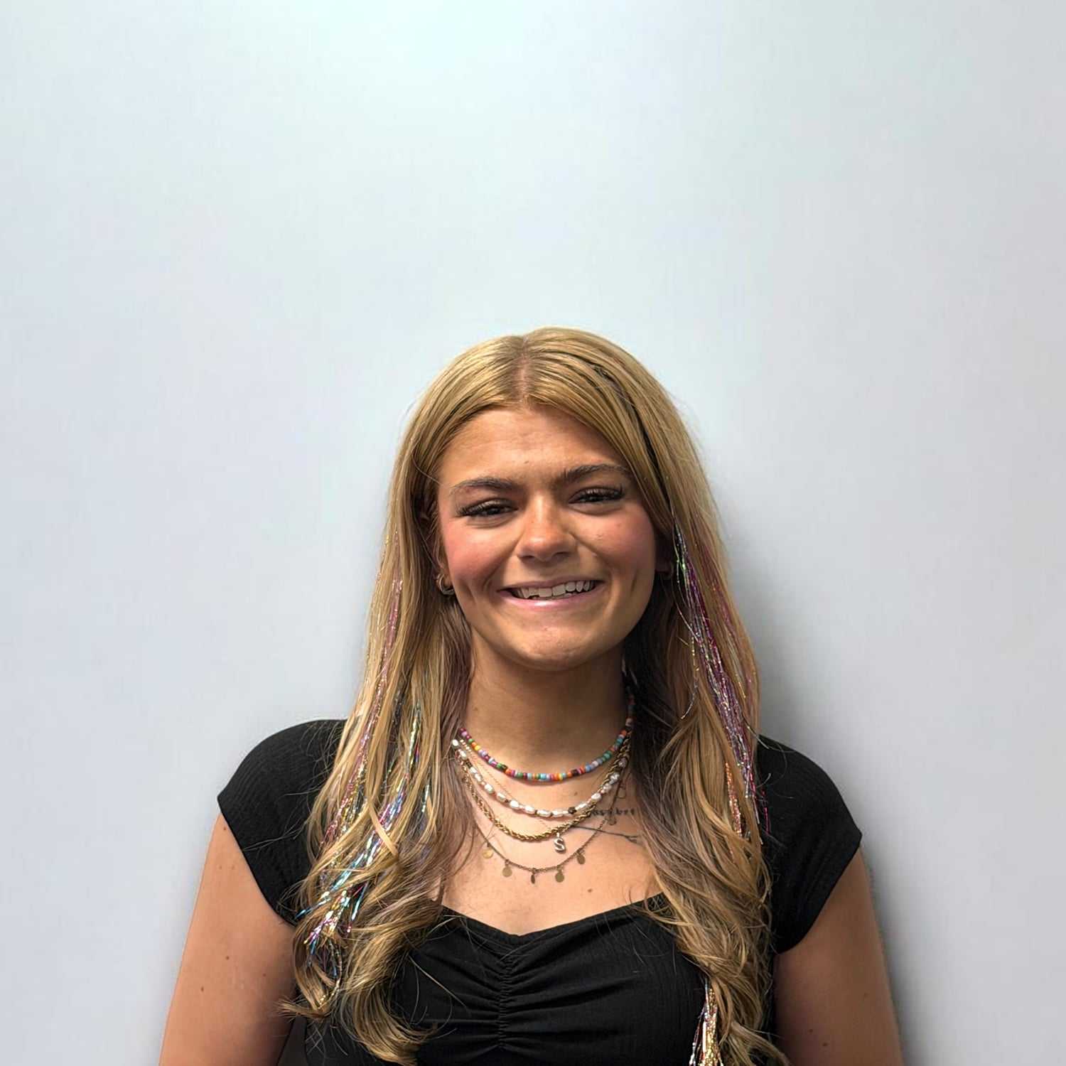 Portrait of Sierra H, a professional stylist at Design 1 Salon & Spa, showcasing their expertise and style.