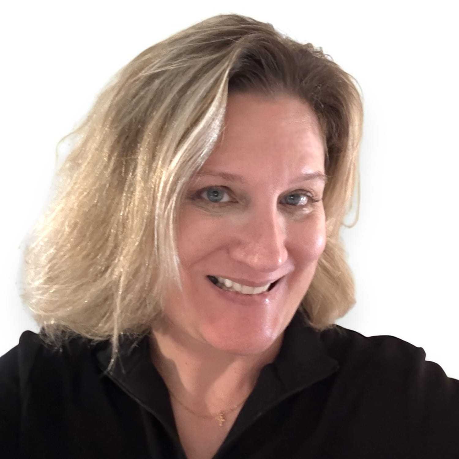 Portrait of Wendy	K, a professional stylist at Design 1 Salon & Spa, showcasing their expertise and style.