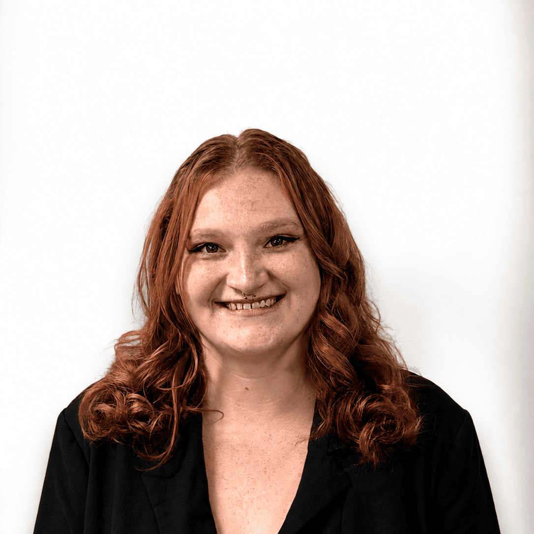 Portrait of Alysa D, a professional stylist at Design 1 Salon & Spa, showcasing their expertise and style.